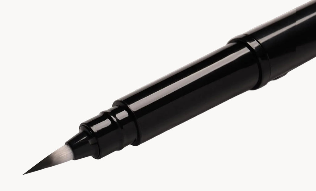 Close-up of Pentel synthetic brush bristles showing sharp point for fine lines