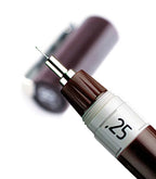 Close-up of rOtring Isograph 0.25mm stainless steel needle point nib for precision drafting.